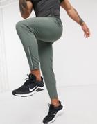 Asos 4505 Woven Skinny Tapered Running Sweatpants With Reflective Zip Detail In Khaki-green