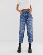 Asos Design Skater Boyfriend Jeans In Mid Blue Wash With Happy Rave Print - Blue