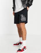 Asos Design Oversized Jersey Shorts In Black With La City Print