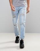 Asos Skinny Jeans With Heavy Rips In Bleach Wash Blue - Blue