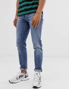 Asos Design Skinny Jeans In Classic Mid Wash-blue