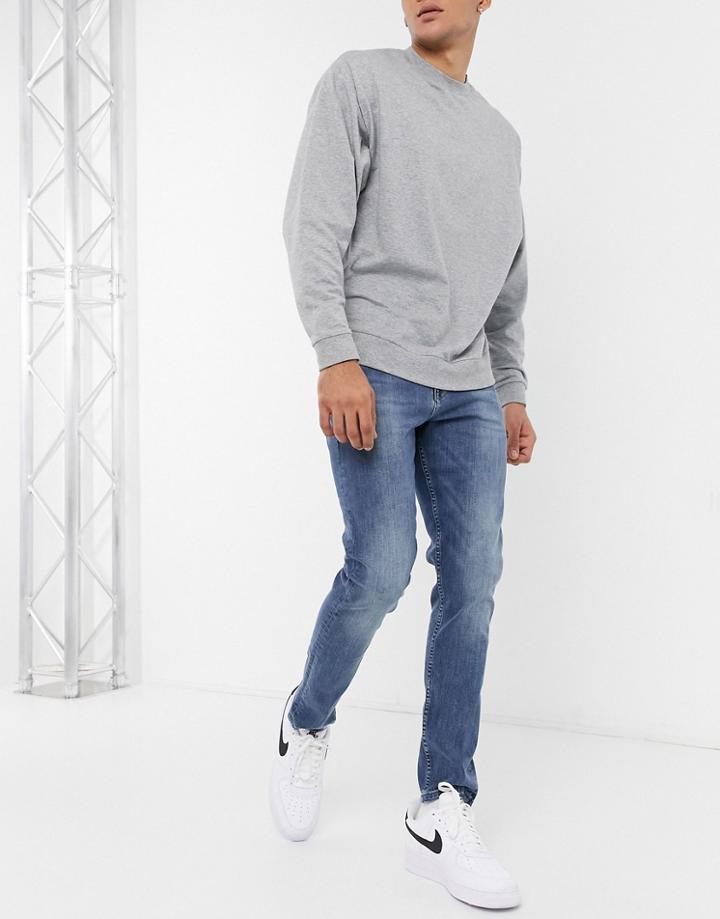 Asos Design Skinny Jeans In Light Greencast Wash-blues