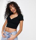 Asos Design Petite Wrap Crop Top With Cap Sleeve In Rib In Black