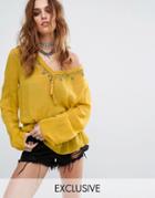 Sacred Hawk Relaxed Blouse With Delicate Beading And Tassel Trim - Yellow