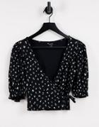 Monki Ulla Organic Cotton Printed Frill Edge Short Sleeve Wrap Top In Black-multi