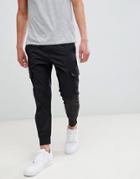 Religion Drop Crotch Cargo Pants In Black - Black