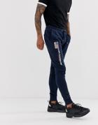 Asos Design Skinny Sweatpants With Embroidered Flag - Navy