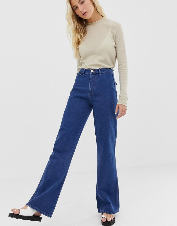 Asos Design Full Length Flare Jeans With Pressed Crease And Western Pockets In Mid Vintage Wash-blue