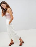 Asos Design Denim Strappy Jumpsuit With Shirring In Off White With Red Stitch - White