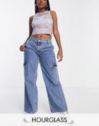 Asos Design Hourglass Recycled Cotton Blend Low Rise 'cargo' Jeans In Mid Wash Blue