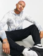 Asos Unrvlld Spply Oversized Hoodie With All Over Wash & Logo Print In Blue-blues