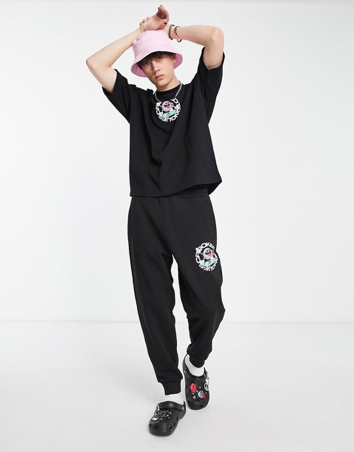 Crooked Tongues Relaxed Sweatpants With Skateboard Ct Man Graphic Print In Black - Part Of A Set