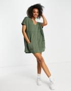 Asos Design Button Through Mini Smock Dress With Pockets In Khaki-green