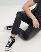 Asos Tapered Jeans In Washed Black With Faux Leather Rip & Repair - Black