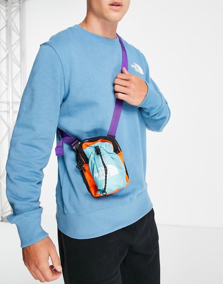 The North Face Bozer Cross Body Bag In Red/blue