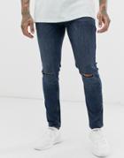 Asos Design Skinny Jeans In Blue Black With Busted Knees