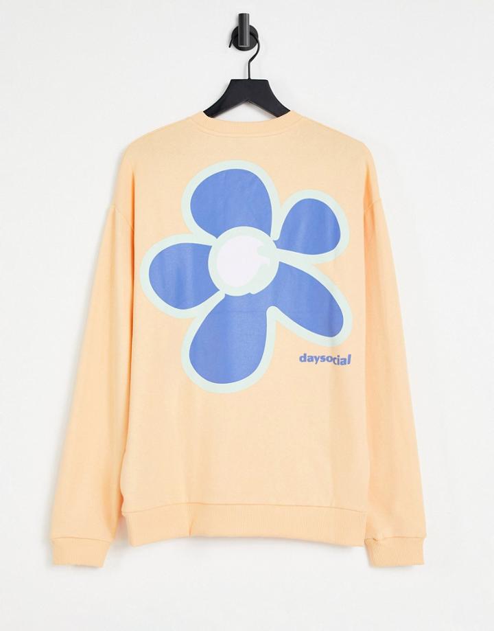 Asos Daysocial Oversized Sweatshirt With Front And Back Flower And Logo Prints In Peach-orange