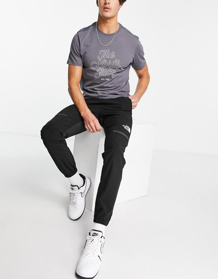 The North Face Training Mountain Athletic Wind Sweatpants In Black