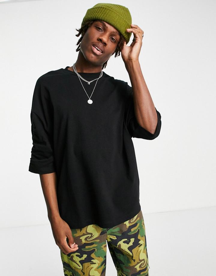 Asos Design Oversized T-shirt With Ruched Sleeve In Black
