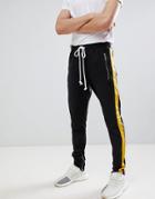 Criminal Damage Skinny Joggers In Black With Yellow Side Stripe - Black