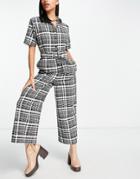 Asos Design Short Sleeve Button Front Belted Fit And Flare Jumpsuit In Mono Check-multi