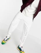 Asos Unrvlld Spply Relaxed Sweatpants With Logo Print In White