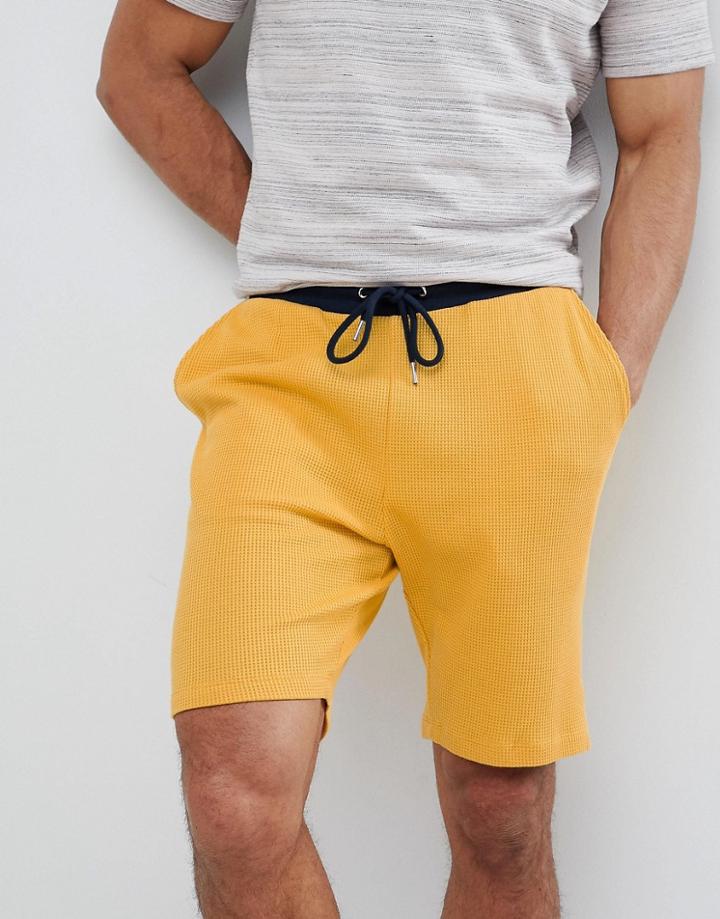 Asos Design Skinny Shorts In Waffle With Contrast Navy Waistband - Yellow