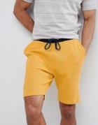 Asos Design Skinny Shorts In Waffle With Contrast Navy Waistband - Yellow