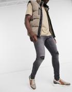 Jack & Jones Intelligence Tom Spray On Jean With Rip In Washed Black