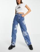 Topshop Oversized Mom Jean With Flower Patches In Mid Blue