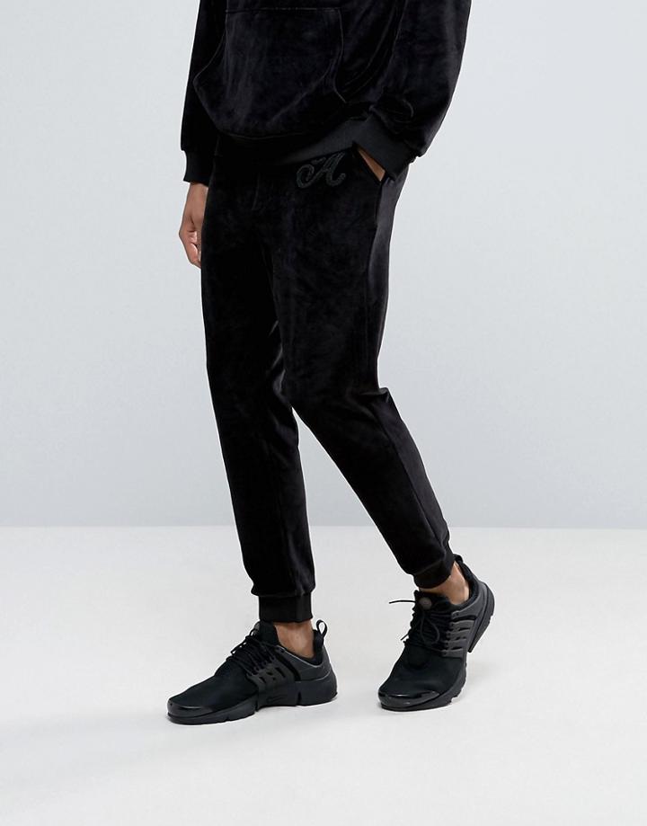 Antioch Tapered Velour Joggers With Embroidered A Logo - Black