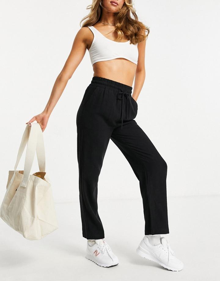 Asos Design Linen Relaxed Tapered Pants In Black
