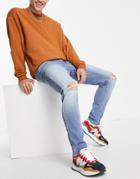 Asos Design Skinny Jeans In 'less Thirsty' Light Wash With Knee Rips-blues