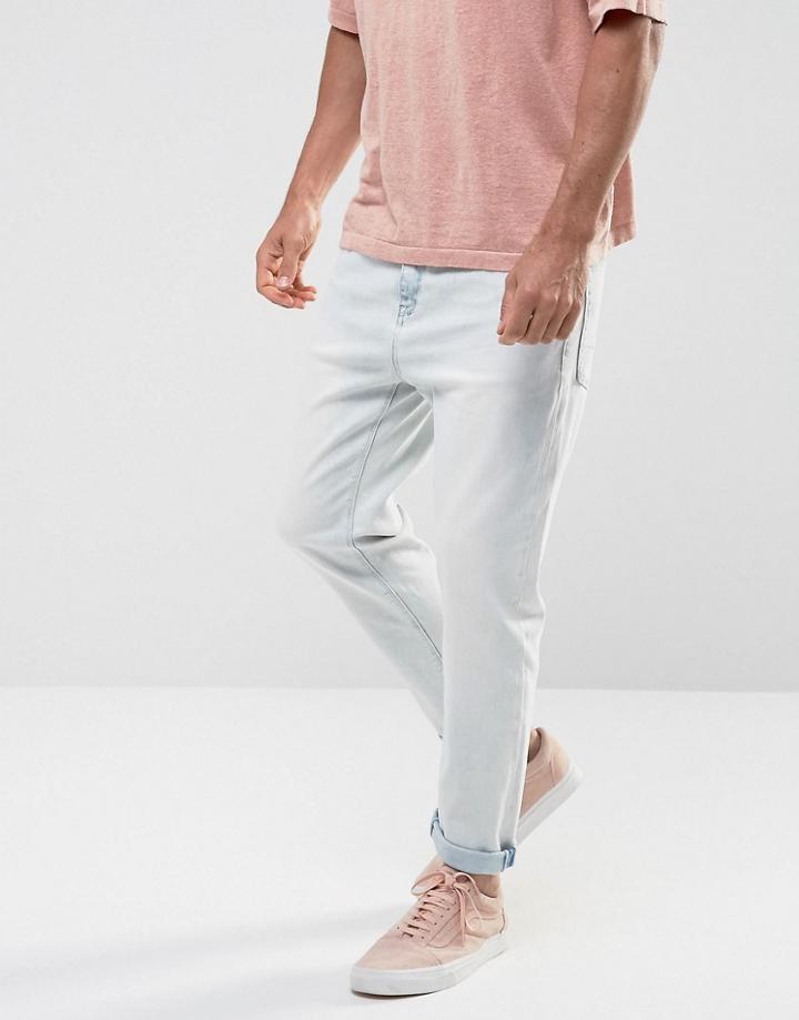 Asos Tapered Jeans In Heavy Bleach Wash - Blue