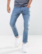 Jack & Jones Jeans In Slim Fit With Rip Repair Detail - Blue