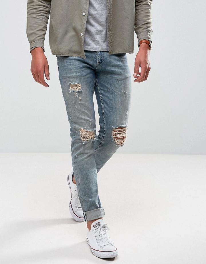 Asos Skinny Jeans In Vintage Mid Wash With Knee Rips - Blue