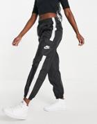 Nike Essential Woven Sweatpants In Black