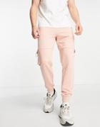 Asos Design Tapered Cargo Sweatpants In Dusty Pink