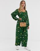 Asos Design Button Front Tie Waist Puff Sleeve Jumpsuit With Long Sleeves In Green Floral Print - Multi