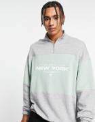 Asos Design Oversized Half Zip Sweatshirt In Gray And Green With Chest Print