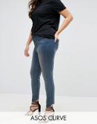 Asos Curve Lisbon Skinny Mid Rise Jean In Dita Tinted Mid Wash With Reverse Stepped Hem - Blue