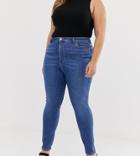 Asos Design Curve Ridley High Waisted Skinny Jeans In Mid Wash Blue