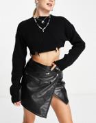 Weekday Ridley Faux Leather Mini Skirt With Asymmetric Hem In Black