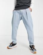 Asos Design Classic Rigid Pleated Jeans In Light Wash Blue