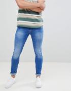 Celio Skinny Fit Jeans In Mid Blue With Raw Hem Edges - Blue