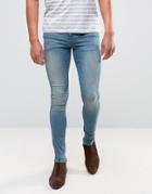 Asos Extreme Super Skinny Jeans With Abrasions In Mid Blue - Blue
