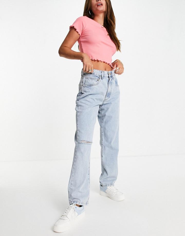 Cotton: On Dad Jeans With Ripped Knee In Bleach Wash-blues