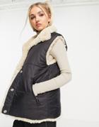 Topshop Puffer Vest Jacket With Reversible Sherpa Lining In Black