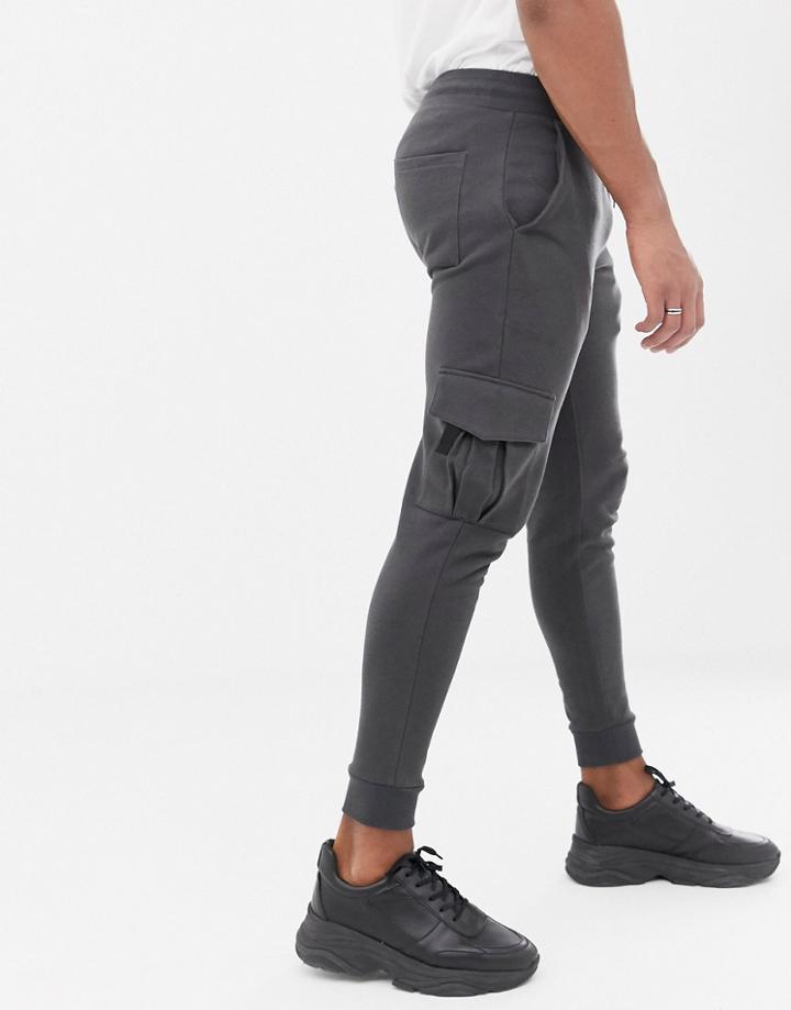 Asos Design Skinny Joggers With Cargo Pocket In Washed Black - Black