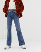 Asos Design Rigid Full Length Flare Jeans In Mid Stonewash Blue